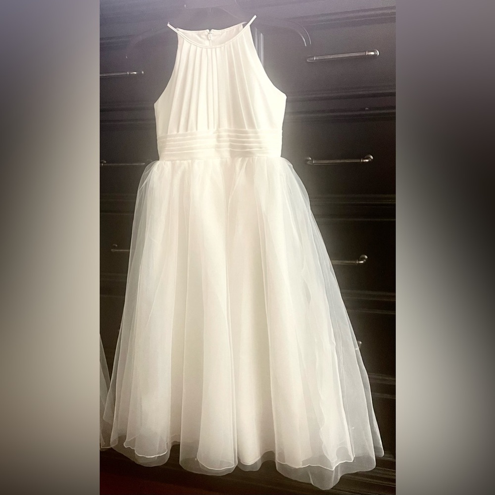 Two Flower Girls dresses size 8 and 10 never worn flower girl dress.